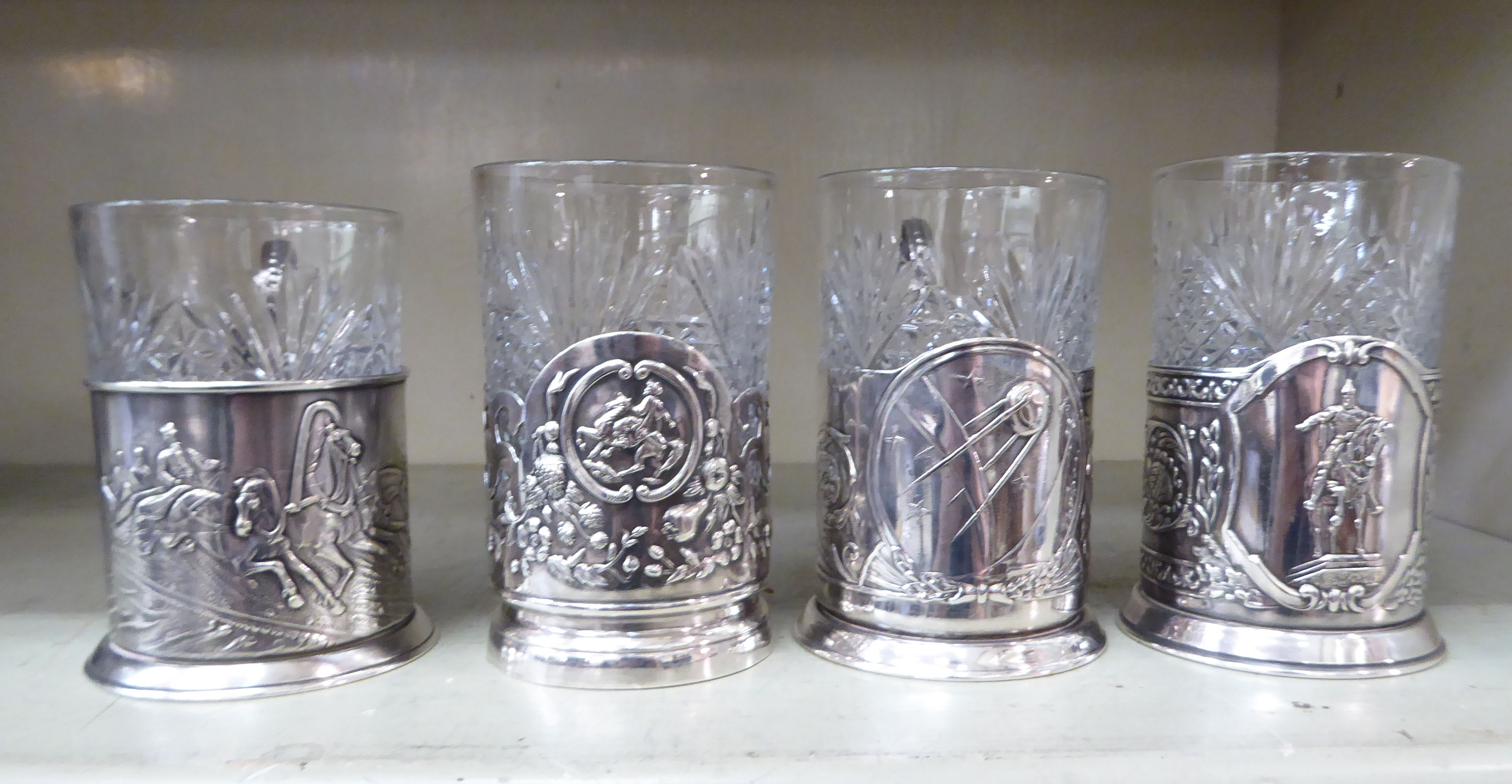Four Russian moulded glass breakers, in matched white metal frames with loop handles - Image 2 of 3
