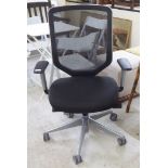 A modern height adjustable home office chair, on splayed legs and casters