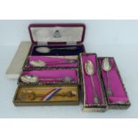 Four identical silver George VI Coronation teaspoons; another with a bead border; and a silver