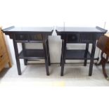 A pair of modern Chinese black lacquered two drawer, two tier hall tables  34"h  31"w
