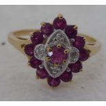 A 9ct gold ruby and diamond set cluster ring