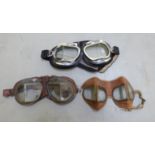 Two dissimilar pairs of vintage airmans' goggles; and a pair of British made,  modern motorcycle