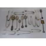 A miscellaneous collection of silver flatware, mainly tea/coffee spoons and sugar tongs  mixed marks