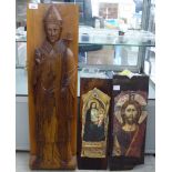 A relief carved teak plaque, featuring a bishop, holding a staff surmounted by a cross  31"h; and