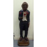 A carved and painted hardwood figure, a standing waiter, on square plinths  40"h