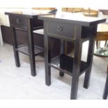 A pair of modern Chinese black lacquered single drawer, two tier bedside tables  28"h  19"w
