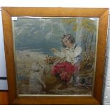 An early 20thC tapestry panel, depicting a boy training a dog  32"sq  framed