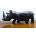 A carved coromandel model, a rhino 18"L