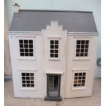 A mid 20thC white and grey painted dolls house  27"h  24"w with a small amount of dolls furniture