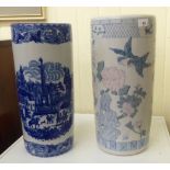 Two modern china cylindrical stickstands  17"h and 18"h