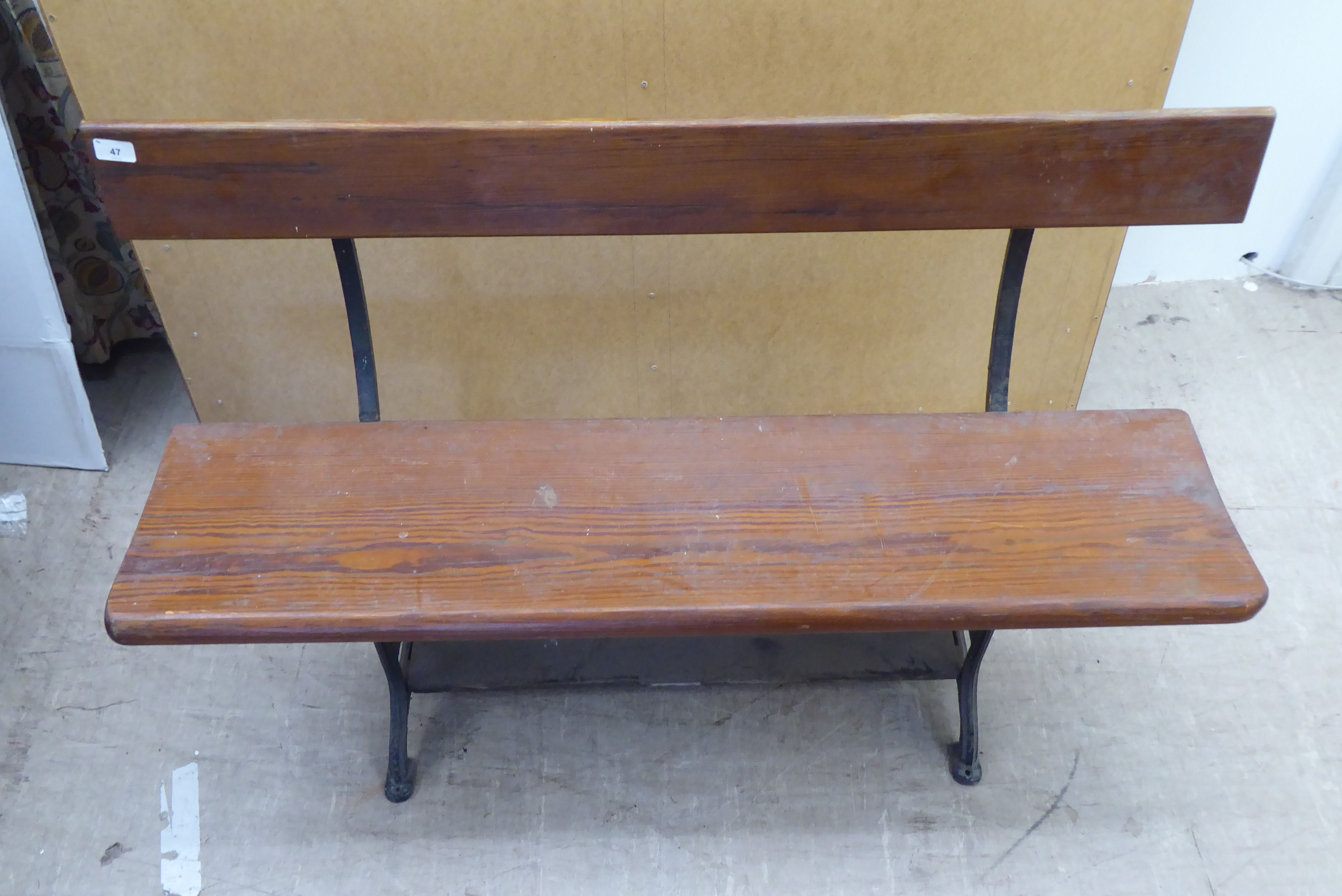 An early 20thC cast iron and planked pine framed two person terrace bench  48"w - Image 2 of 3