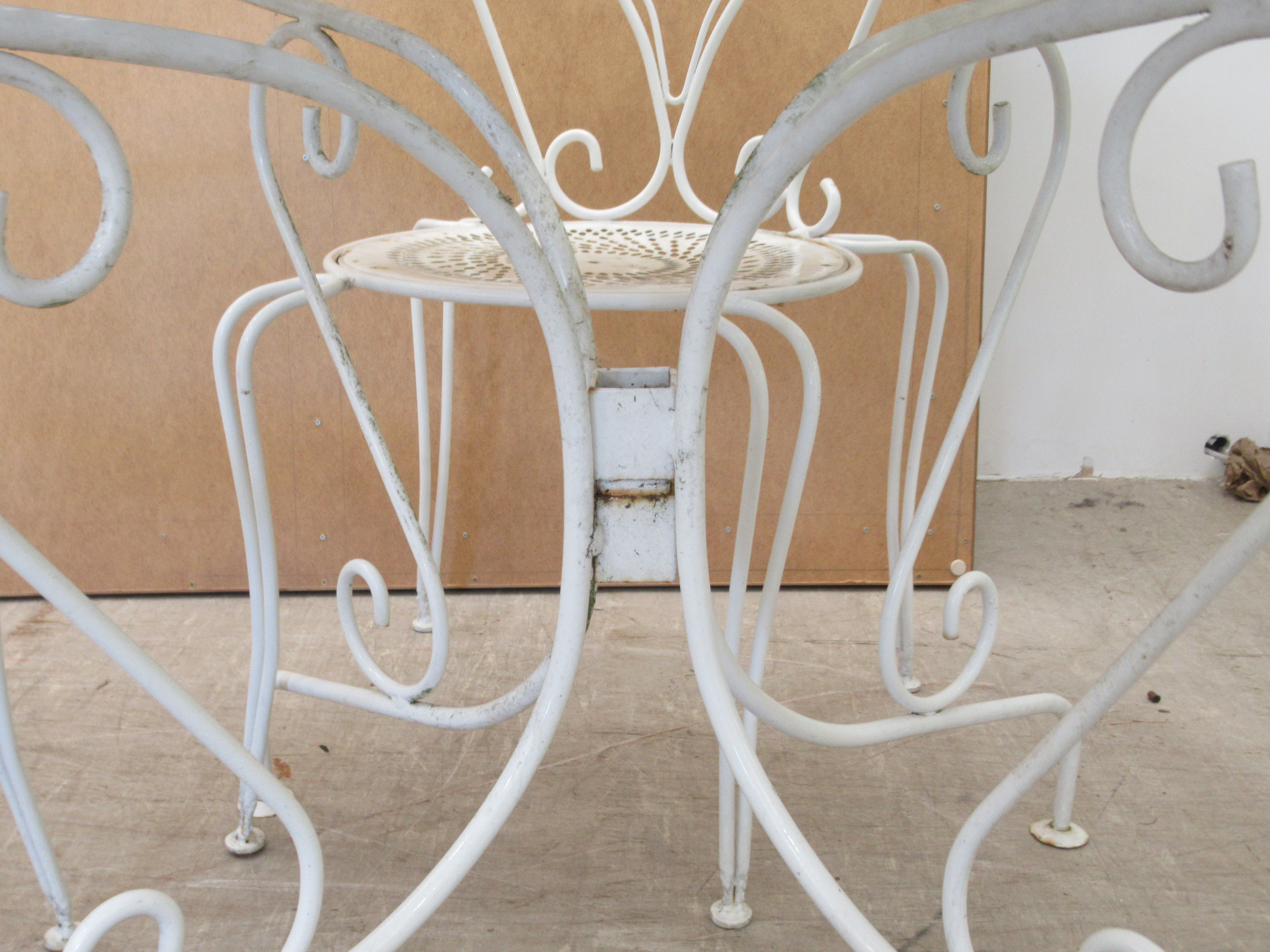 A 20thC white painted cast metal three part patio table  30"h  37"dia; and a matching set of four - Image 4 of 5