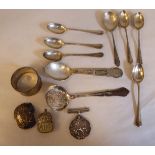 Silver items: to include a set of six rattail pattern coffee spoons; a napkin ring; and two