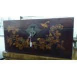 A 20thC Chinese painted blanket chest with straight sides and a hinged lid, on a plinth  14"h  27"w
