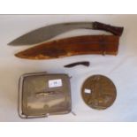 A mixed lot: to include a kukri with a skinning knife, in a hide sheath  the blade 12"L