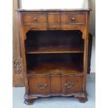 An early 20thC Queen Anne style crossbanded mahogany serpentine front, two drawer and open front,