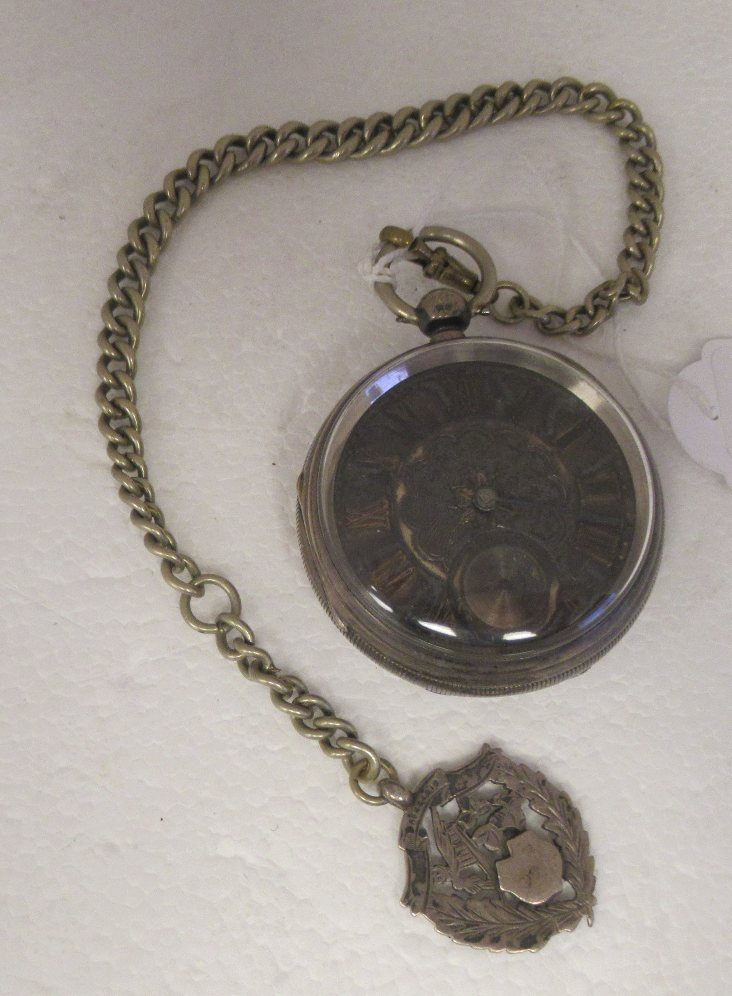 A silver cased pocket watch, the verge movement faced by an engine turned dial with gilded Roman