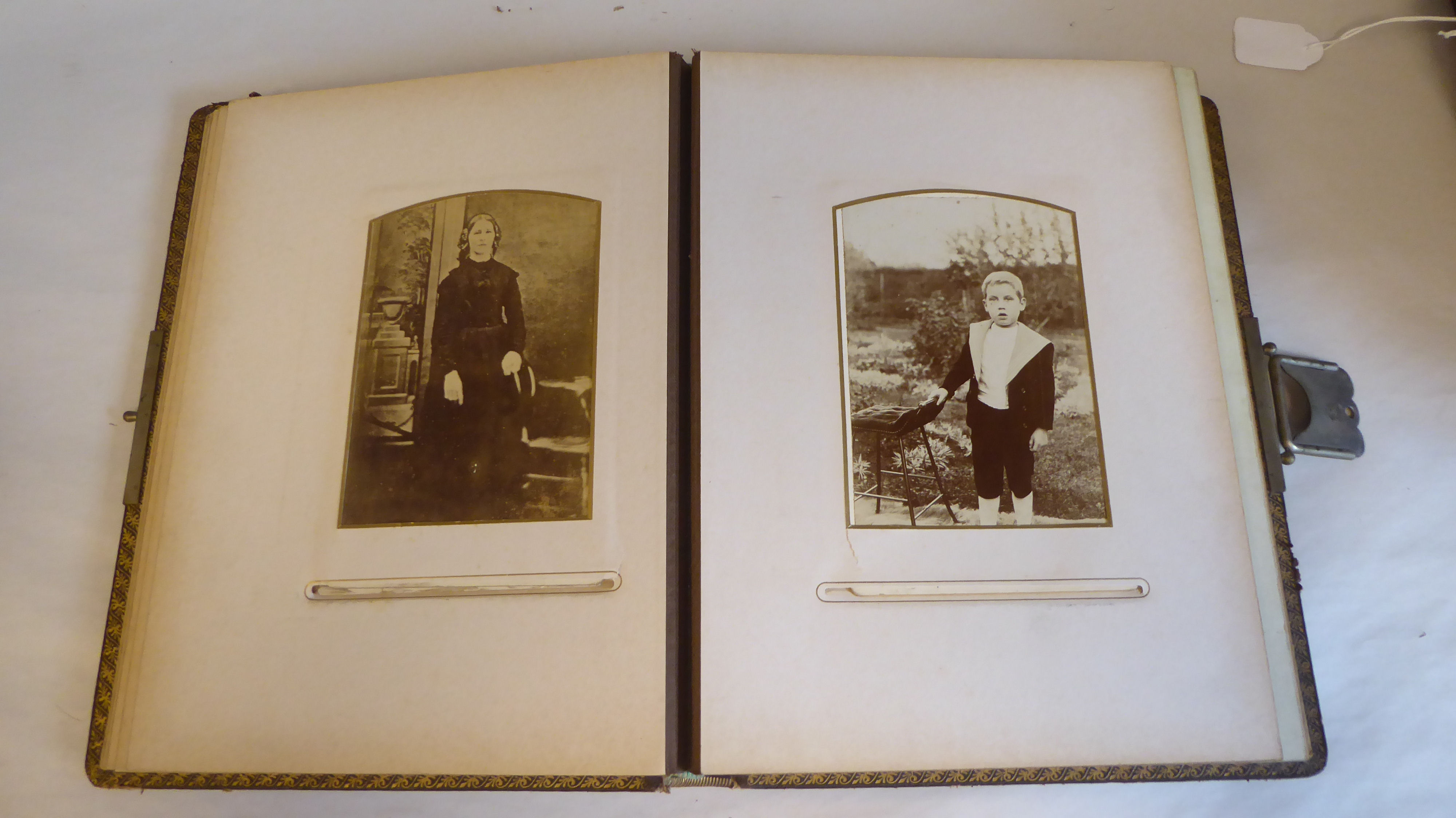 Two late Victorian brown hide carte de visite albums - Image 6 of 8