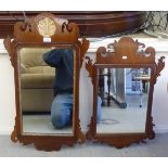 Two similar Georgian mirrors, each in a fretworked mahogany frame  largest 32" x 18"