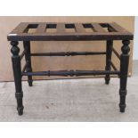 A late Victorian oak luggage stand, raised on turned legs, united by spindle stretchers  18"h  24"w