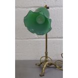 A circa 1900 NAS Benson brass desk lamp with a green bellflower design shade, on a tripod base  15"h
