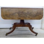 A George III mahogany Pembroke table, raised on splayed legs  29"h  39"w