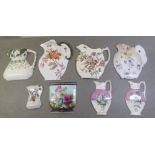 Ceramics wall art, mainly fashioned as jugs with examples by Wedgwood and Doulton Burslem