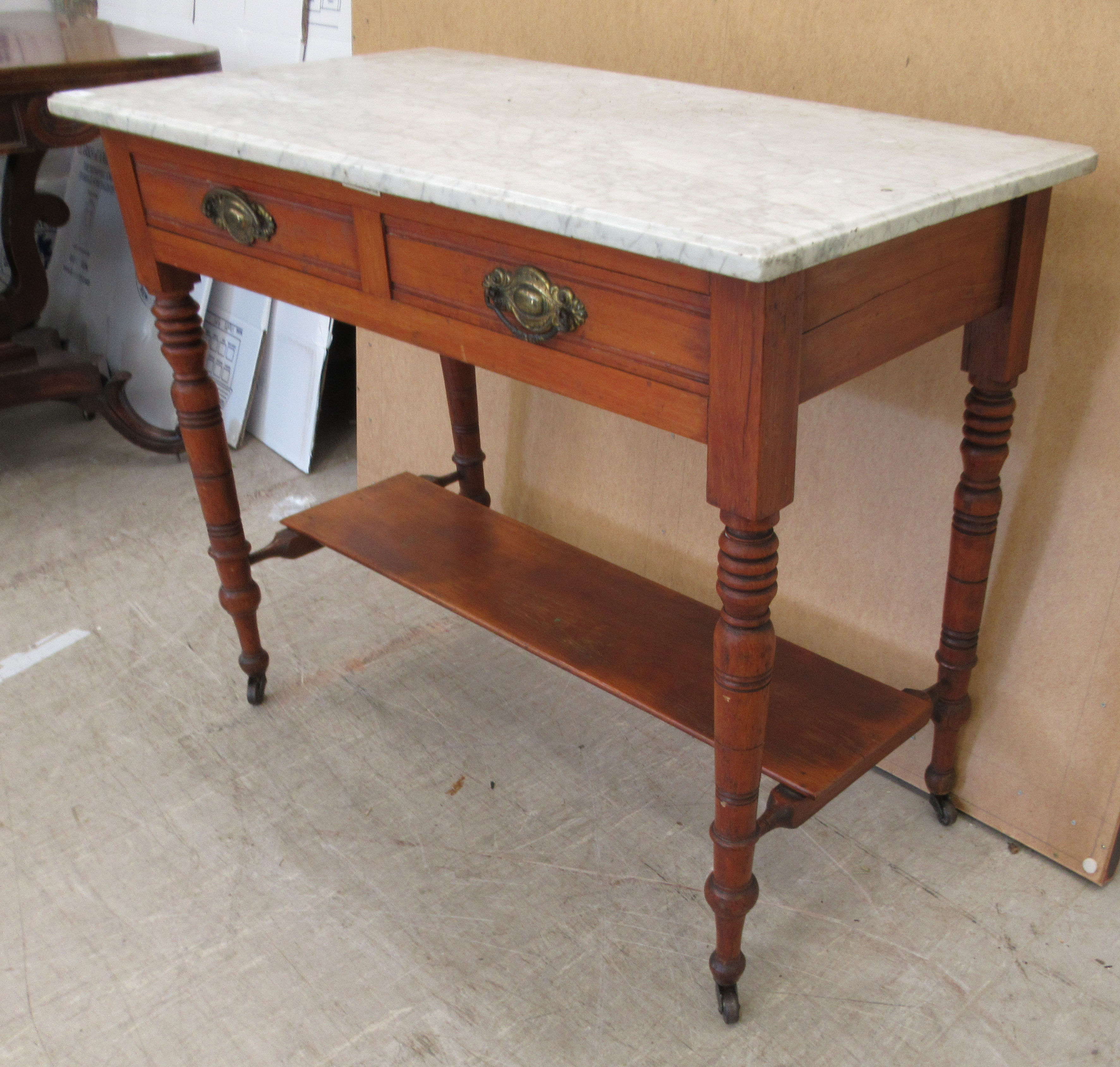 A late Victorian washstand with a marble top, over a mahogany underframe with two frieze drawers, - Image 3 of 6