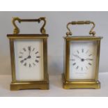 Two similar lacquered brass cased carriage timepieces, each faced by a Roman dial  4.5"h
