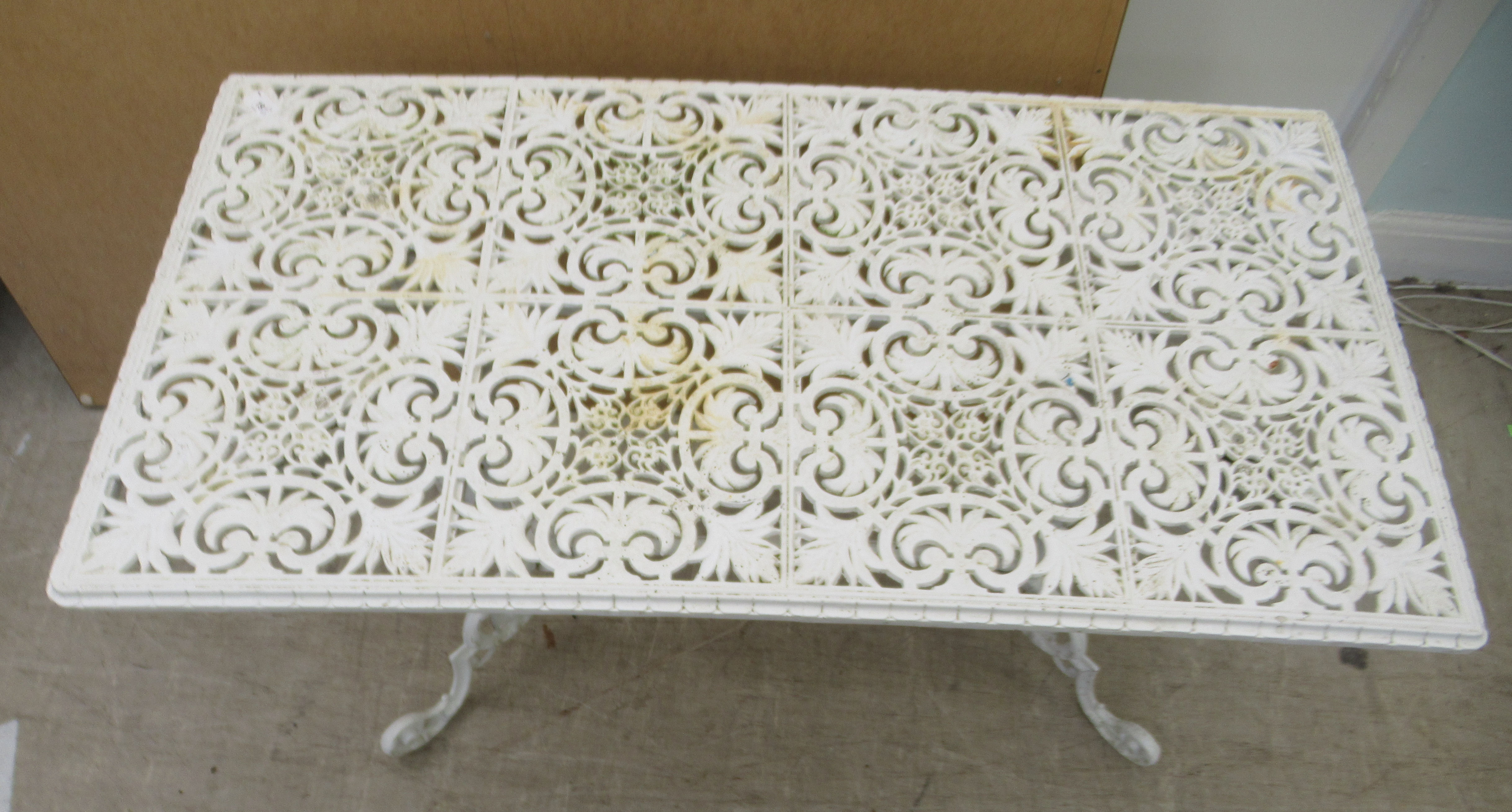 A Victorian style white painted cast metal terrace table, raised on pillar supports and C-scrolled - Image 2 of 3