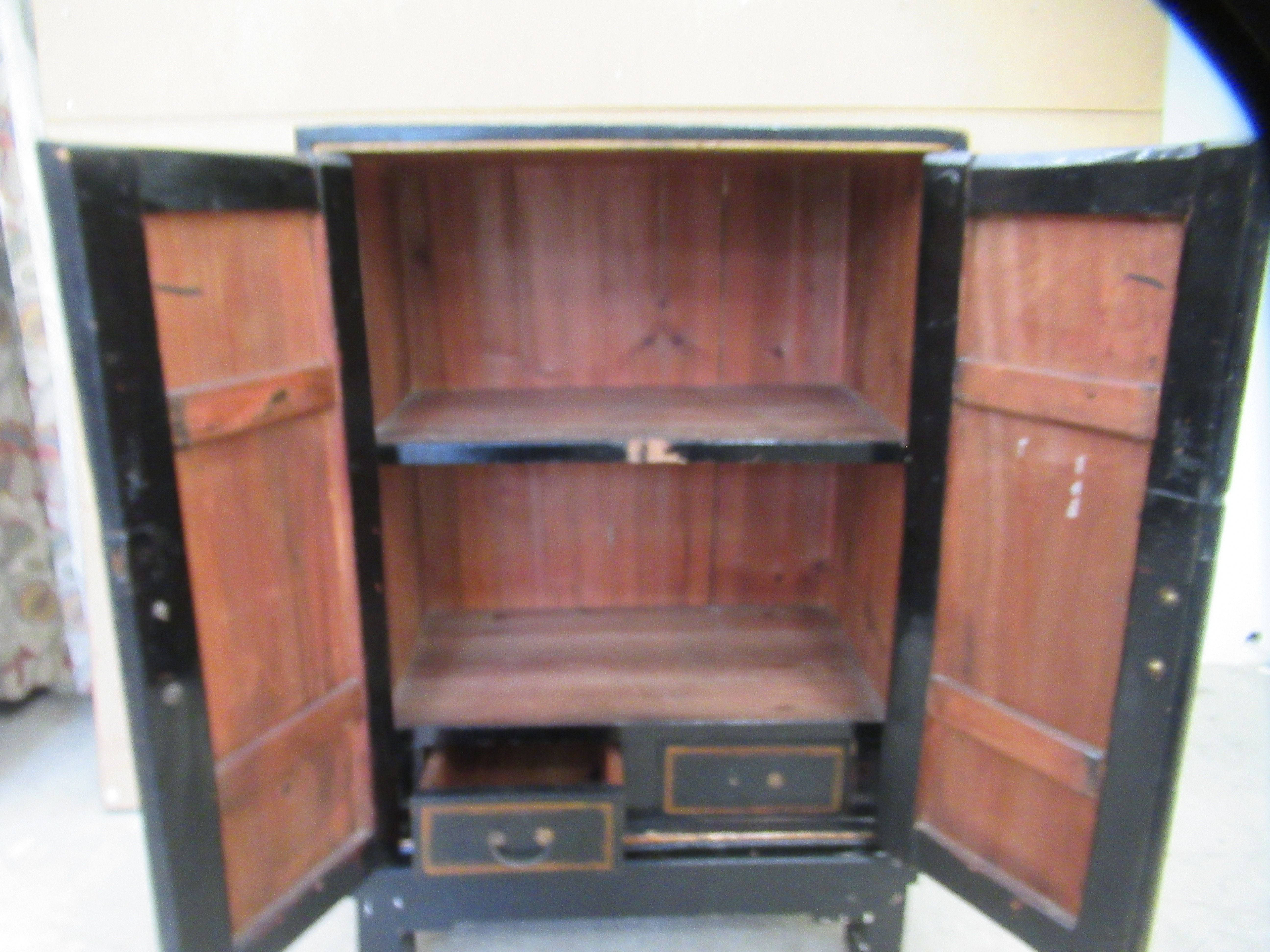 A 20thC Japanese black lacquered low cabinet on stand, decorated with birds and foliage  32"h  21"w - Image 4 of 5