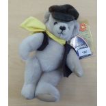 A Merrythought Iron Bridge George Teddy bear, in cream coloured plush with mobile limbs  10"h