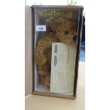 A Merrythought 'The Liberty Teddy bear' in golden plush with mobile limbs  12"h  boxed