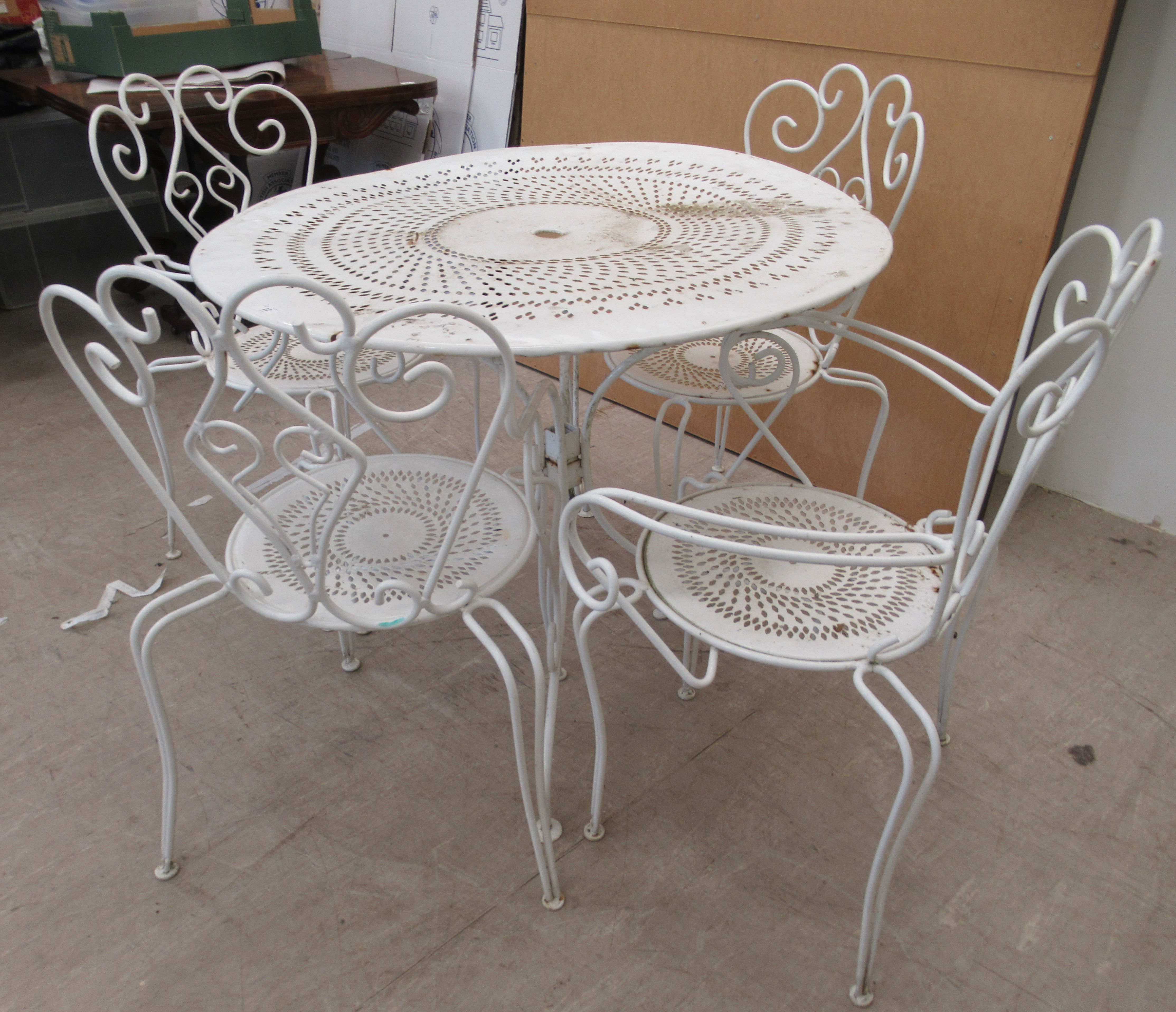 A 20thC white painted cast metal three part patio table  30"h  37"dia; and a matching set of four - Image 2 of 5