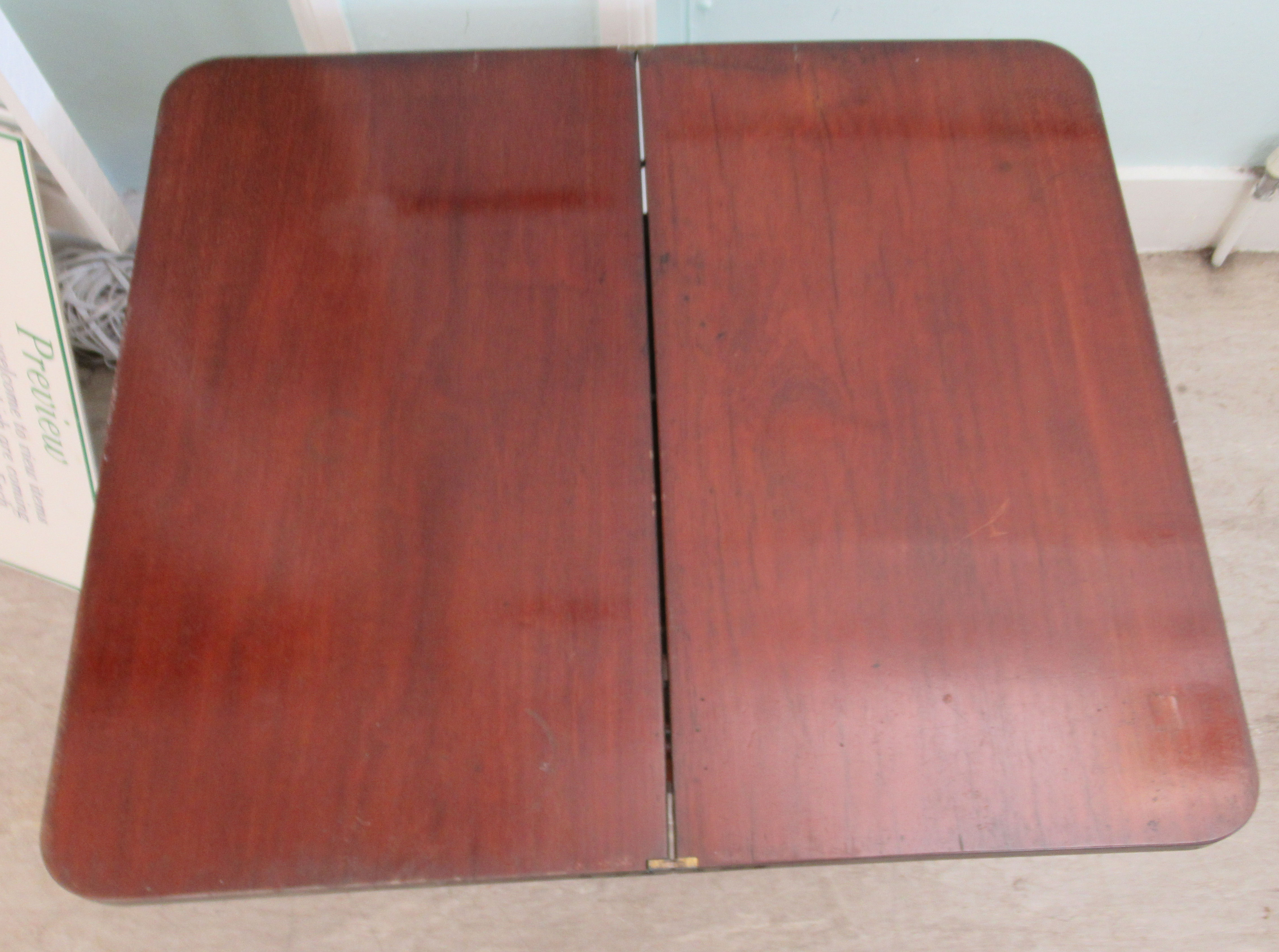 A Regency mahogany pedestal tea table with a rotating foldover top, on a splayed plinth  26"h  25"w - Image 4 of 4