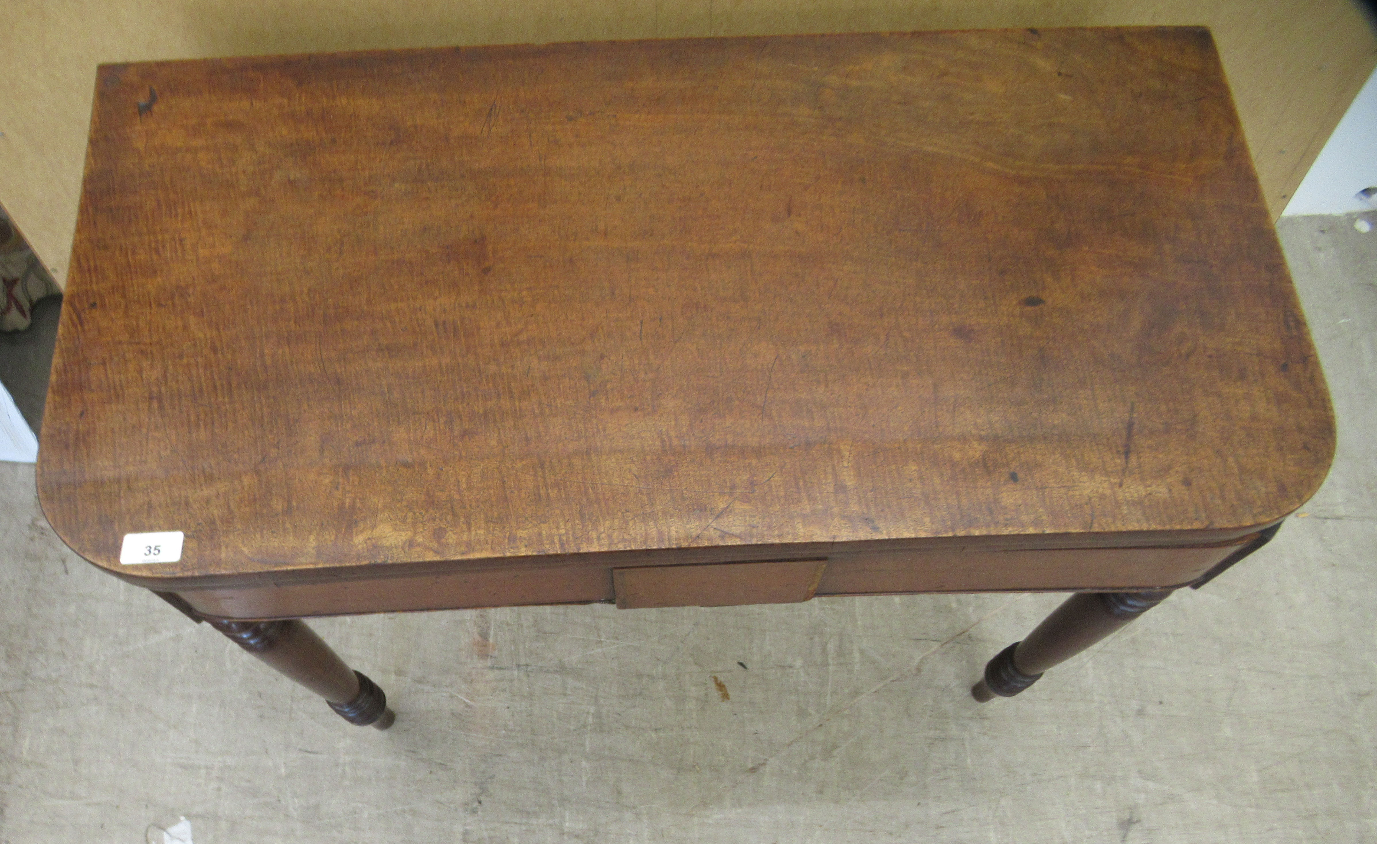 A George III mahogany bow front tea table, the rotating foldover top raised on ring turned, - Image 2 of 5