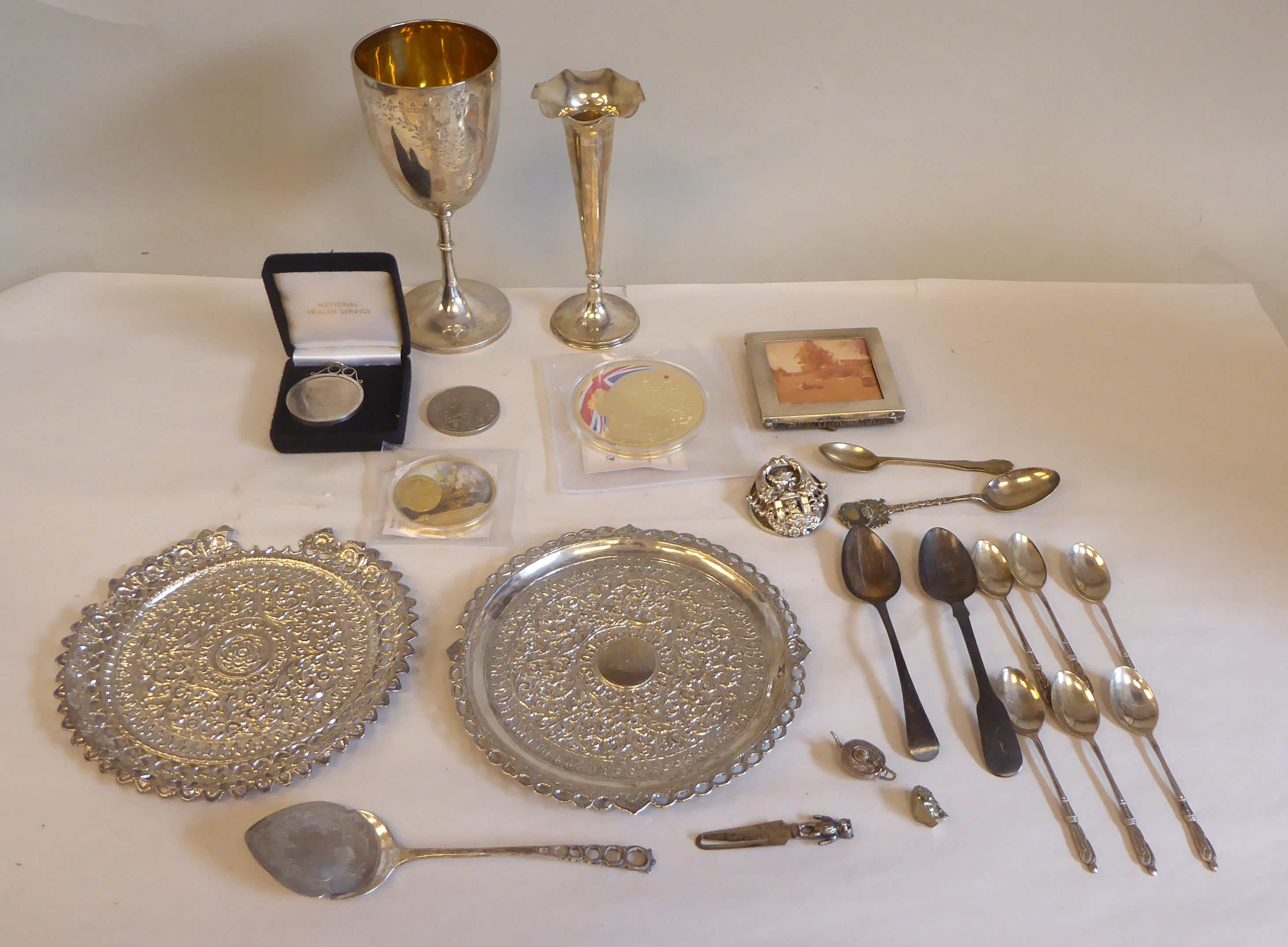 Uncollated coins, silver and white metal items: to include a photograph frame  3" x 3"; a goblet and