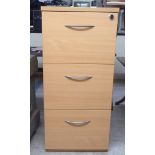 A modern beech three drawer filing cabinet  41"h  19"w  23.5"deep