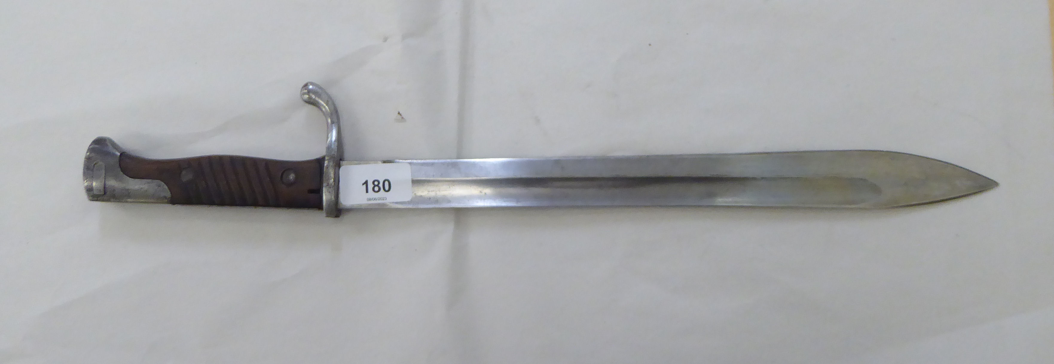 A World War II period European steel bayonet, the blade 14.5"L (Please Note: this lot is subject