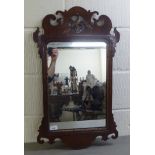 A late Regency carved mahogany framed pier glass  29"h  17"w