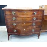 A George III string inlaid mahogany serpentine front, four graduated drawer dressing chest, raised