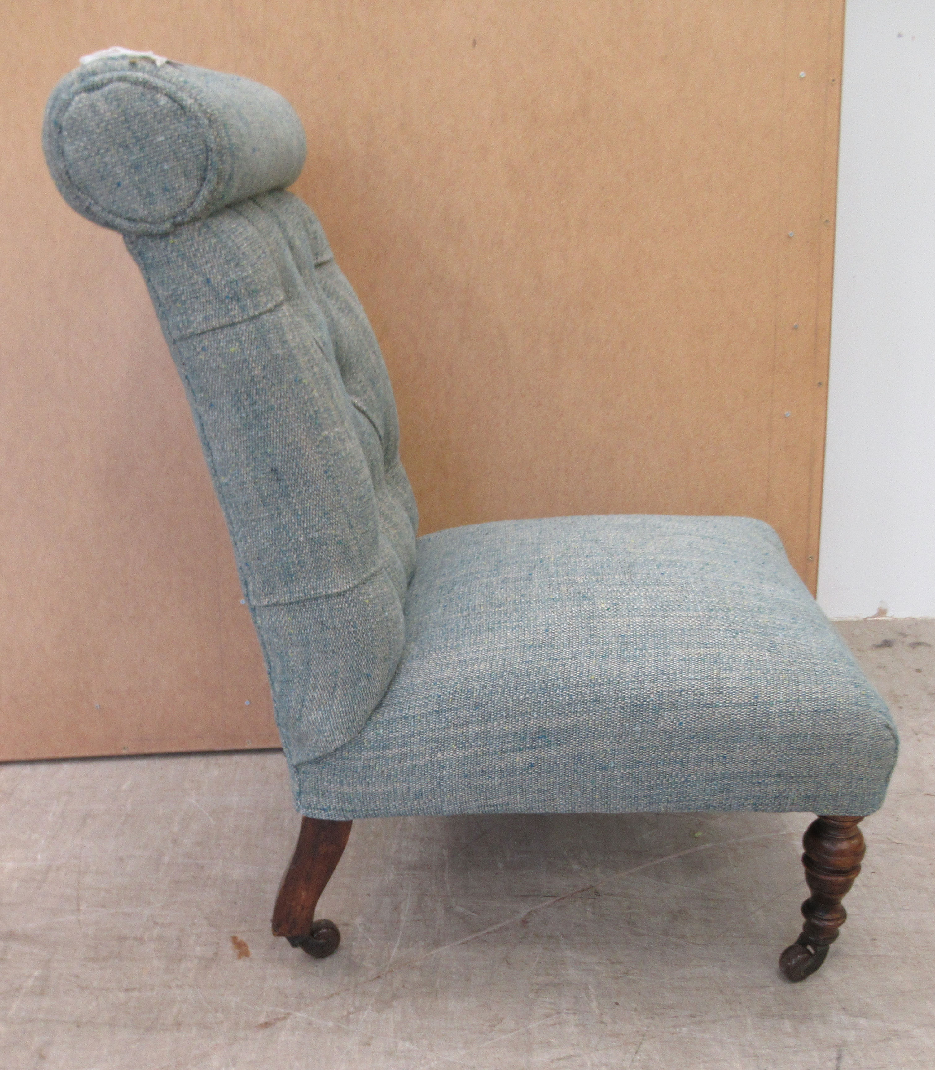 An Edwardian nursing chair, later upholstered in multi-coloured fabric, raised on turned forelegs - Image 2 of 5