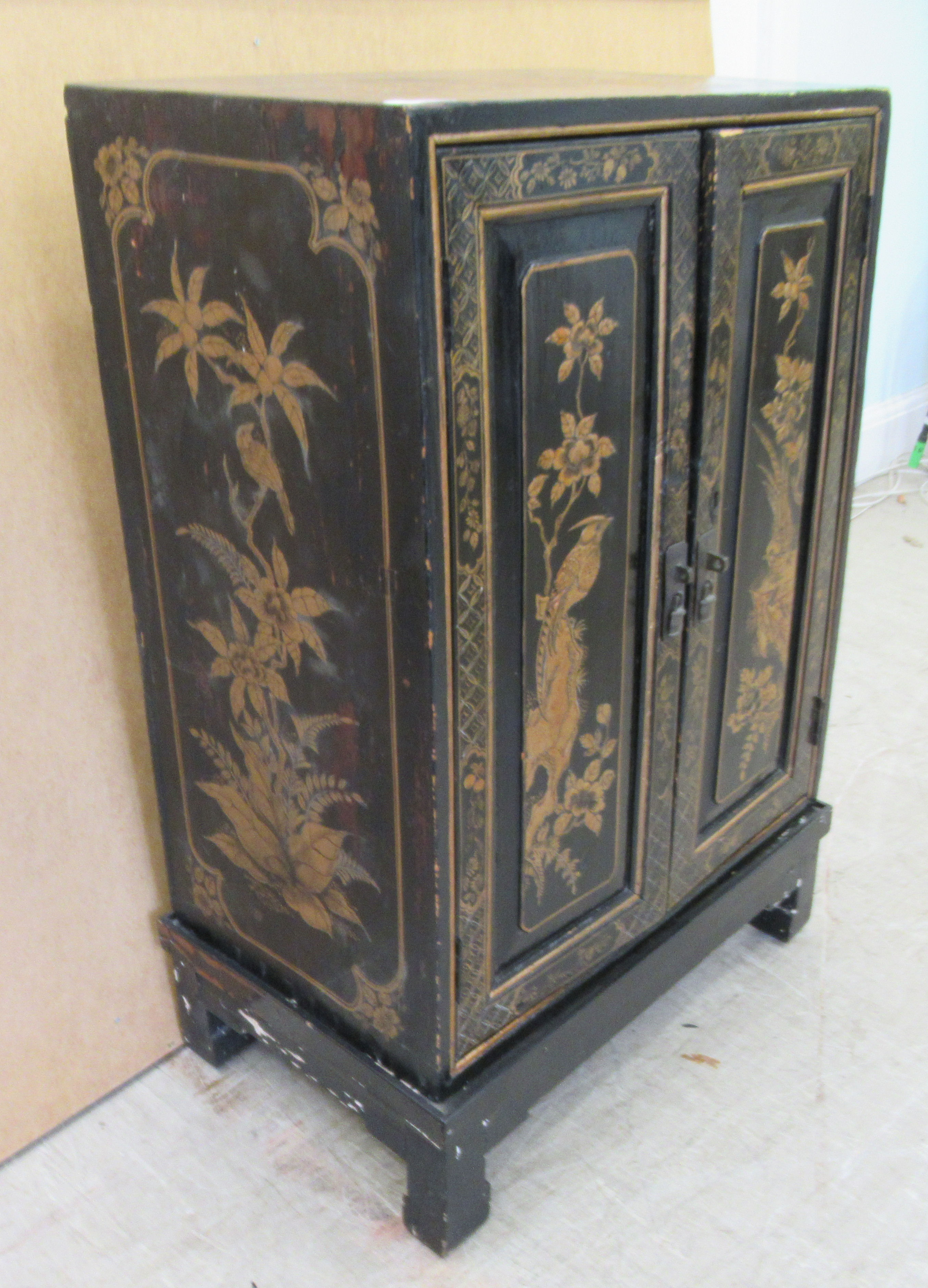 A 20thC Japanese black lacquered low cabinet on stand, decorated with birds and foliage  32"h  21"w - Image 3 of 5