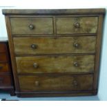 A late Victorian mahogany five drawer dressing chest, on a plinth  47"h  48"w