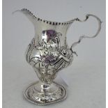 A George II silver pedestal cream jug  London 1741  4.5"h