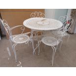 A 20thC white painted cast metal three part patio table  30"h  37"dia; and a matching set of four