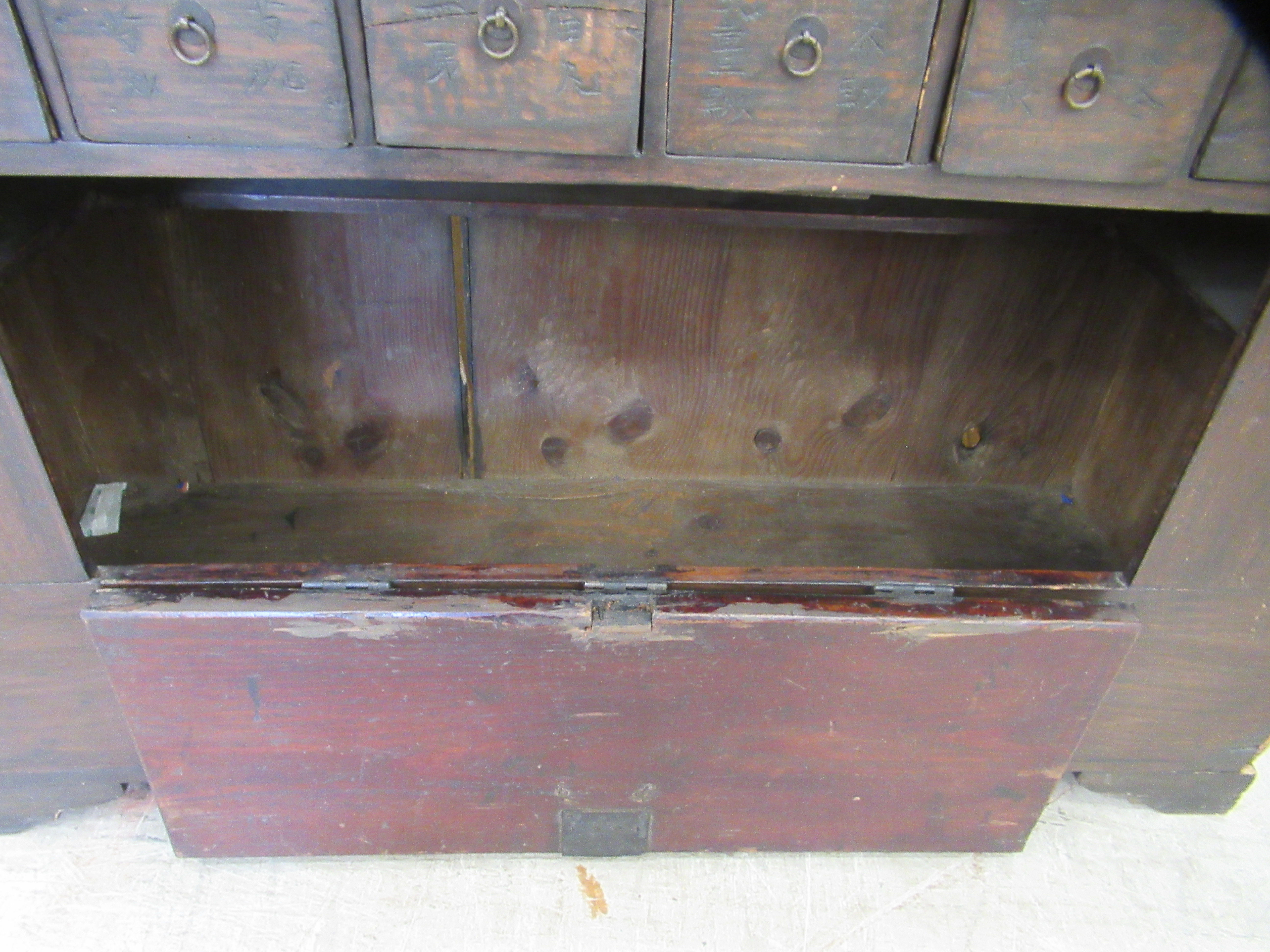 A 20thC Chinese stained pine medicine cabinet with an arrangement of fifty-two drawers, over a - Image 8 of 10