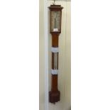An early 20thC oak cased C Baker of Holborn, London stick barometer  38"h