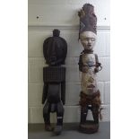 Two carved wooden tribal figure  43" & 34"h