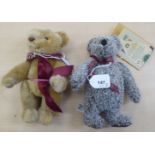 Two Merrythought Teddy bears, one in golden plush, the other in grey, each with mobile limbs  9"h